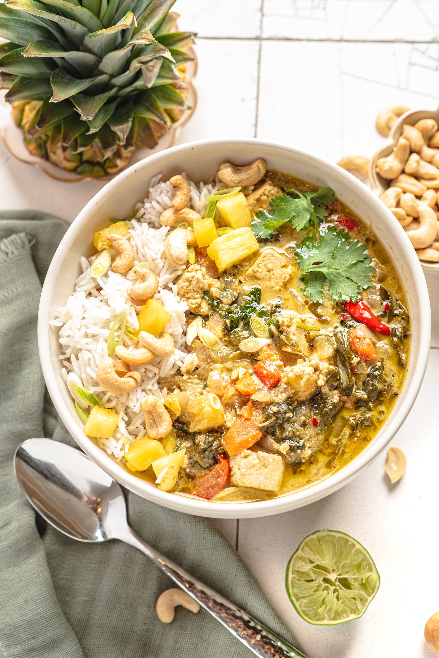 https://terianncarty.com/wp-content/uploads/2023/04/SLOW-COOKER-PINEAPPLE-AND-TOFU-GREEN-CURRY-4.jpeg