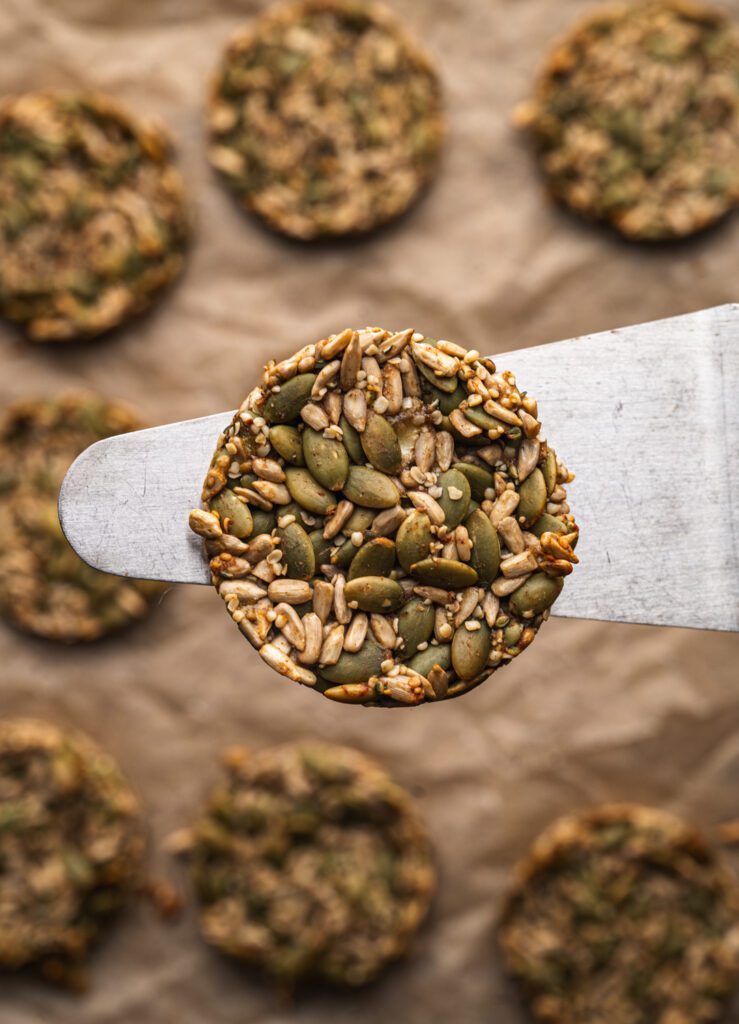 spatula holding healthy seed cookie