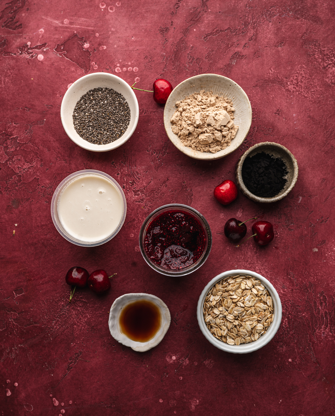 all the ingredients for black forest overnight oats in separate containers before being mixed together